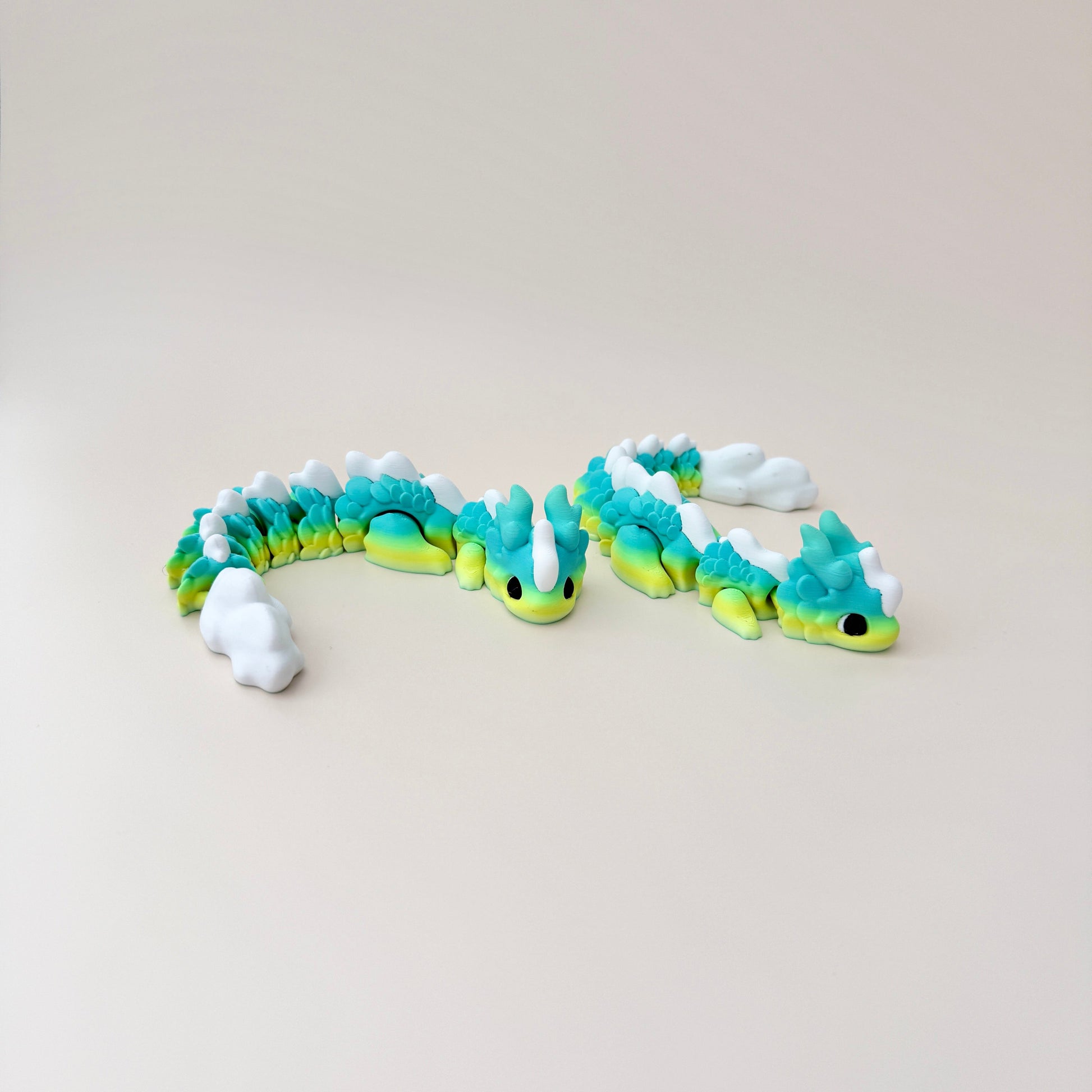 Kaida dragon fidget toy with detailed scales, gradient colours, and fully articulated body for sensory play.