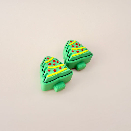 Christmas tree clicker fidget toy in green with red baubles and yellow tinsel, perfect for sensory play.