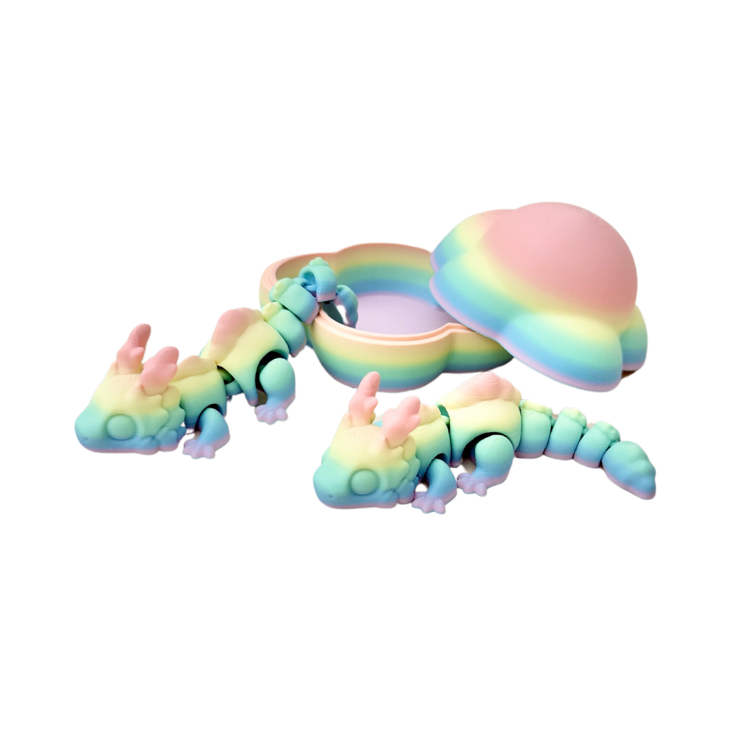 Pastel rainbow Cloud Dragon fidget toy with horns, scales, and claws, 12.5cm in length.