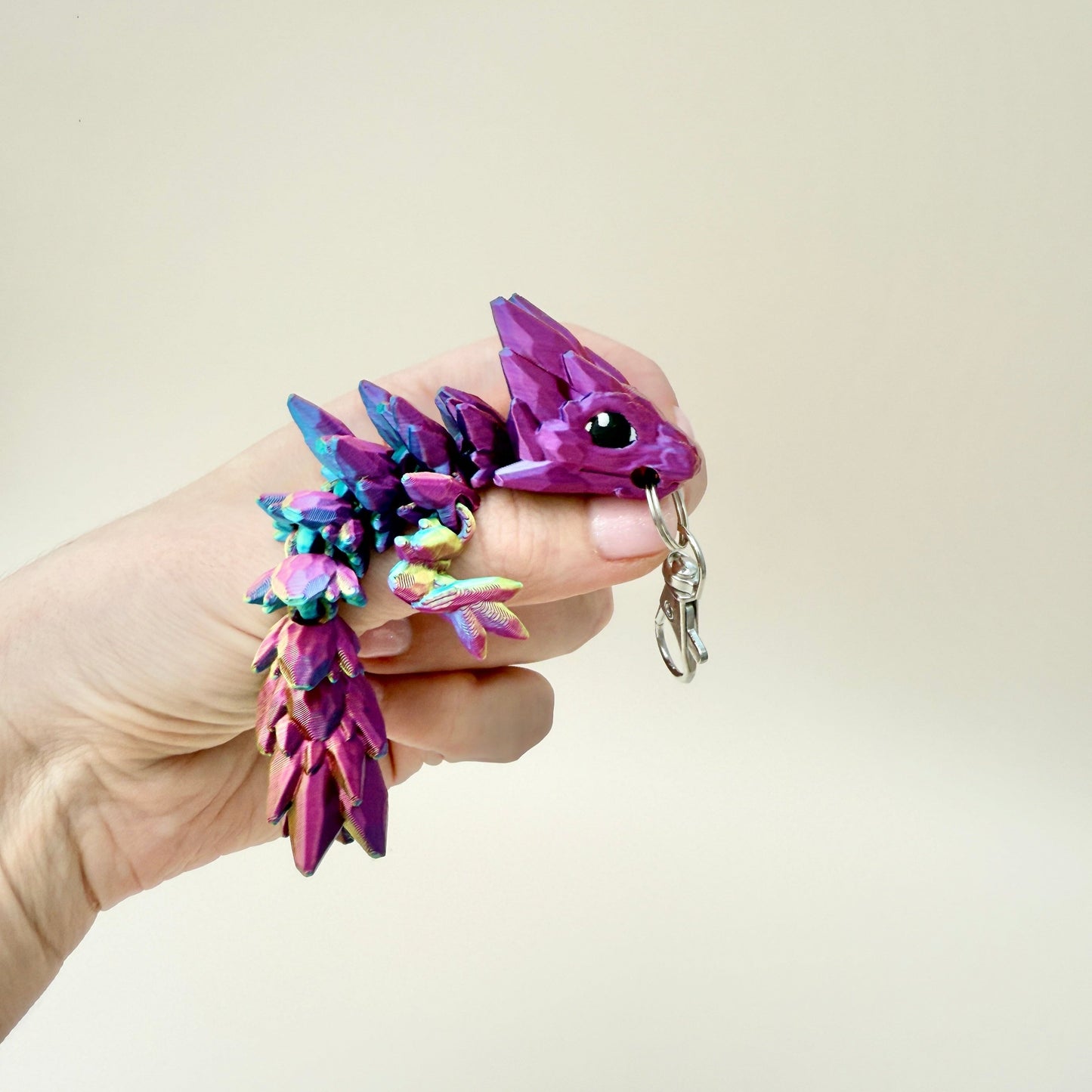 11cm Crystalborne dragon keychain, designed with colour-shifting filament and detailed spikes.