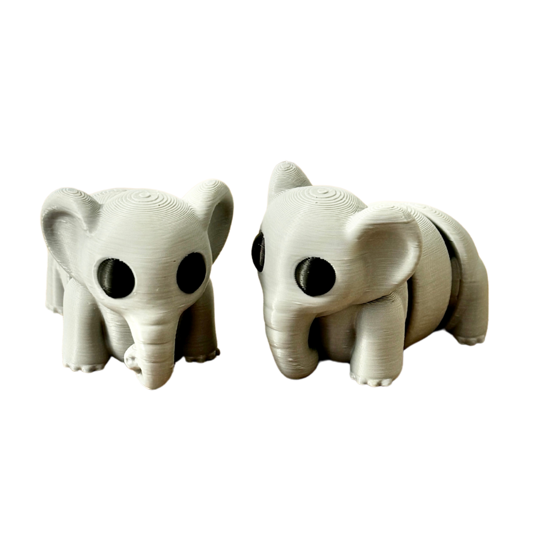 Close-up of a grey elephant fidget toy with black eyes, featuring a movable, articulated body for tactile engagement.