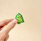 Green Christmas tree clicker fidget toy with a portable design and fun clicking motion.