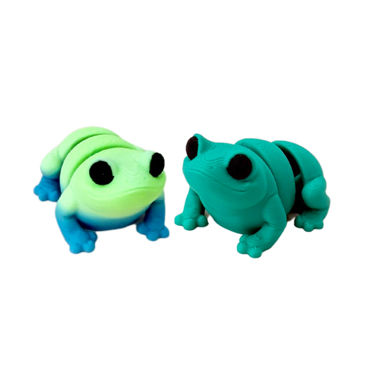 Green frog fidget toy with black eyes, just over 4cm in size, designed for sensory play.