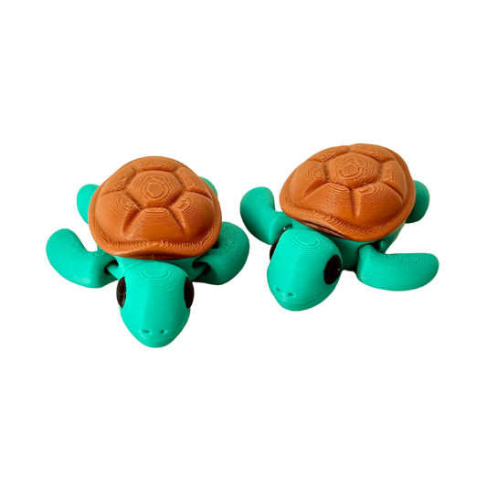 Green turtle fidget toy with a flexible body, perfect for sensory play and stress relief.