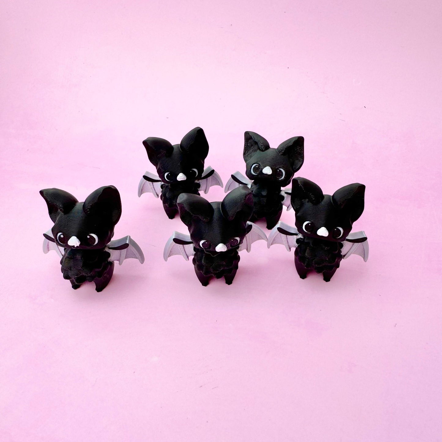 Halloween Bat Fidget Toy with spooky black wings and a flexible design, perfect for adding a touch of Halloween fun to your sensory collection.