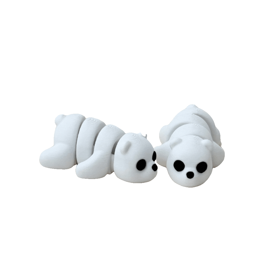 White polar bear fidget toy with black eyes and nose, 6cm in length, perfect for sensory play.