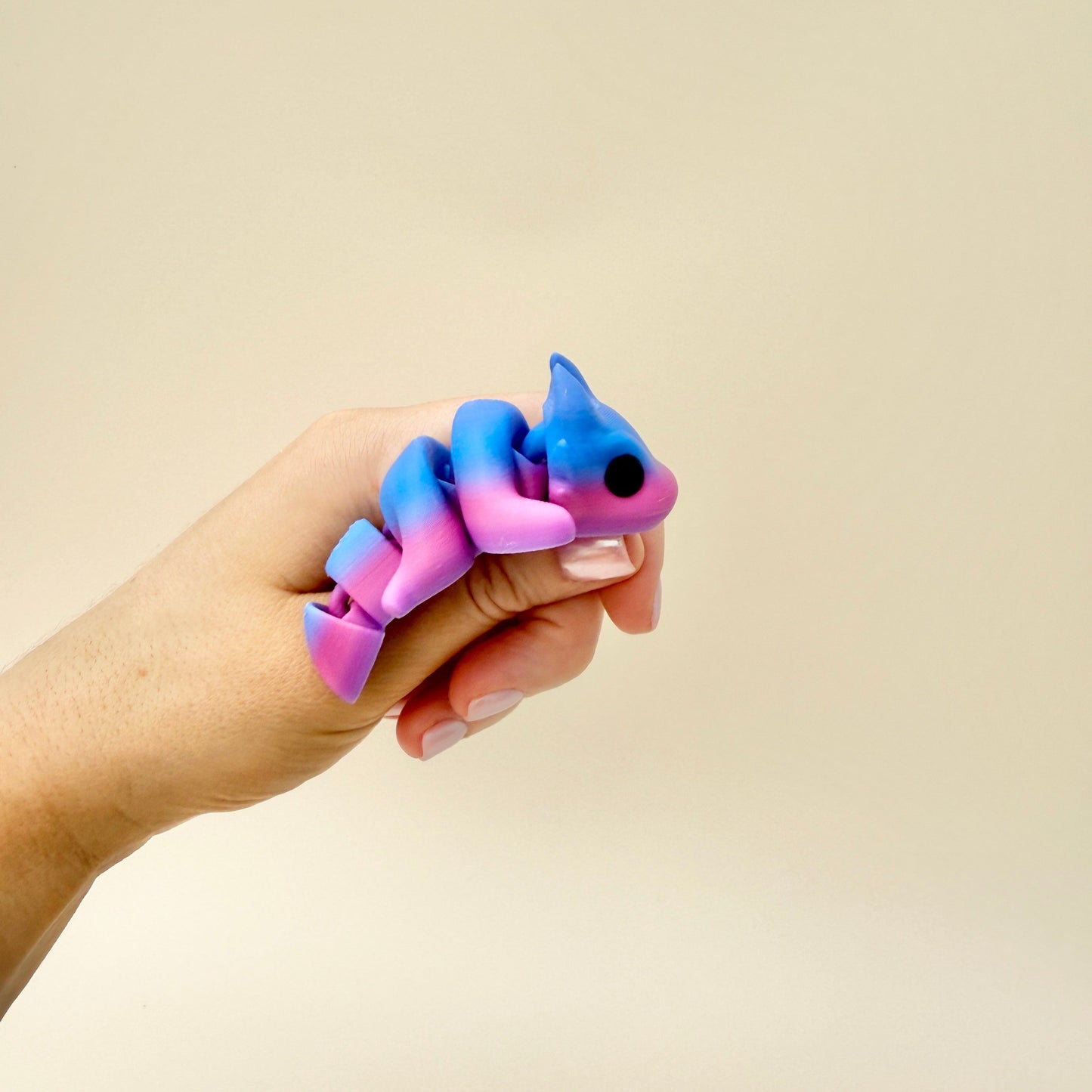 8cm Baby Dragon fidget toy featuring a stunning purple and blue gradient with intricate detailing.