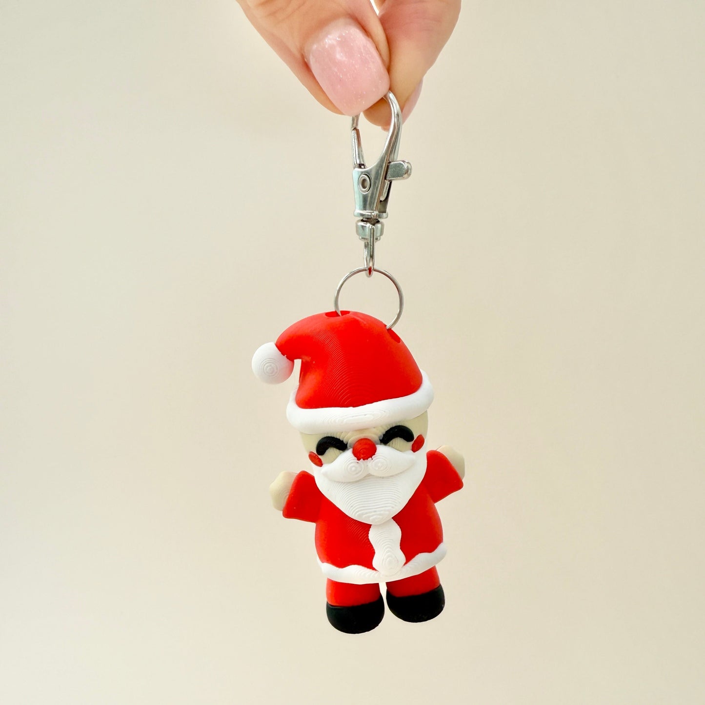 Festive Father Christmas keychain with moving parts, perfect for keys and sensory play.