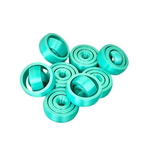 Shiny green fidget spinner with a sleek design, perfect for stress relief and sensory play.