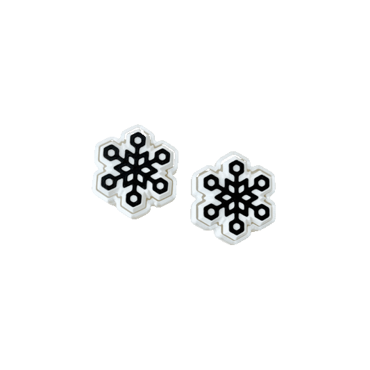 White snowflake clicker fidget toy with black snowflake design, just under 4cm, perfect for sensory play.