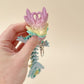 Compact Heart Dragon Tadling keyring with articulated body, rainbow shine, and heart-shaped accents.