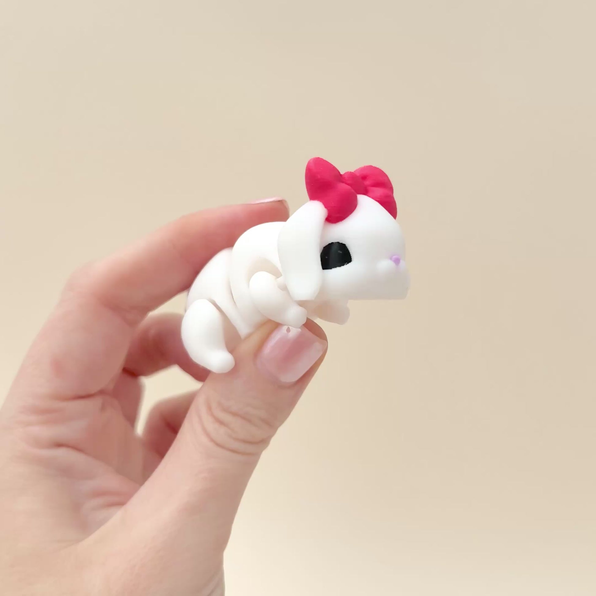 Small 6cm bunny fidget toy with articulated features, perfect for on-the-go sensory relief.